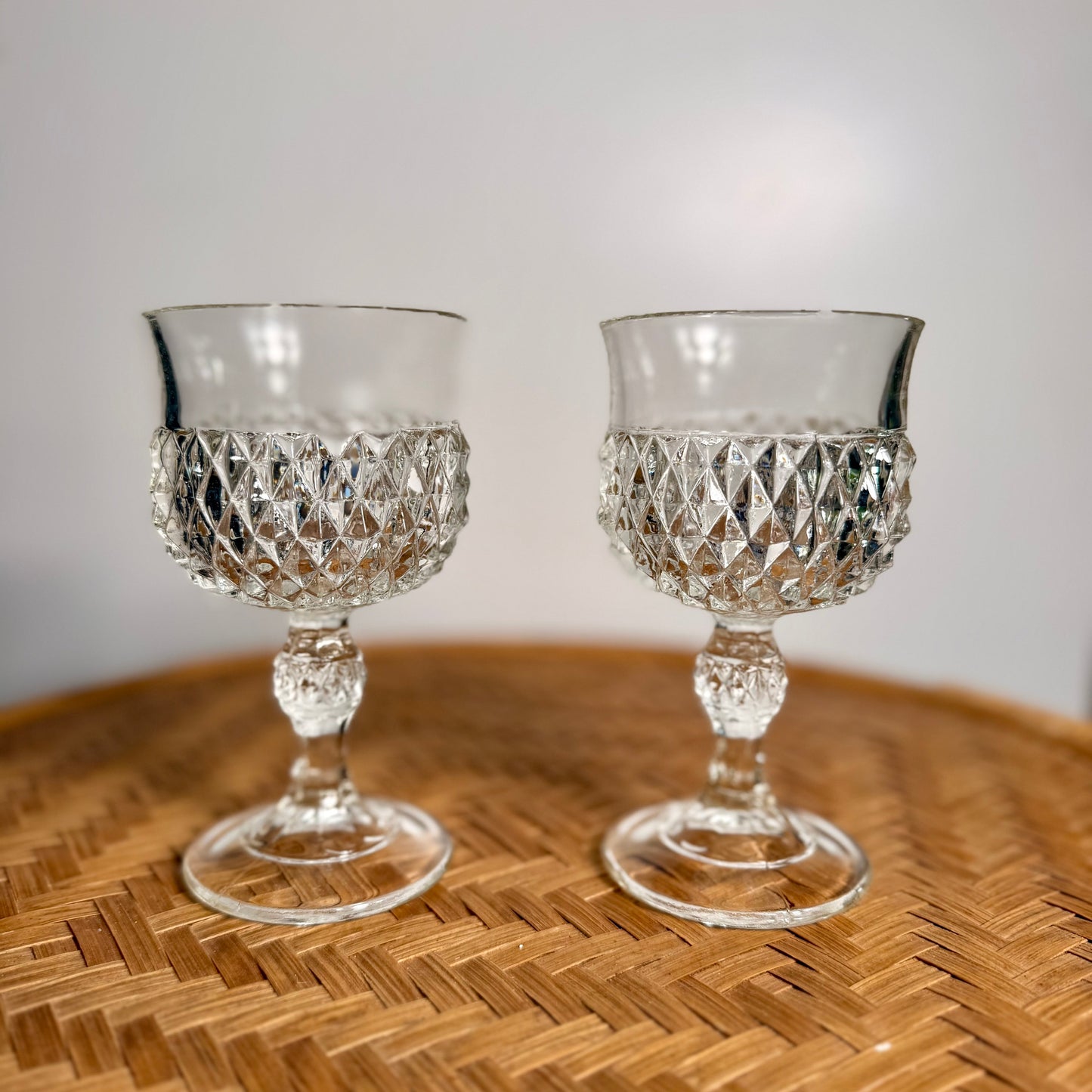 Set of two clear diamond point wine goblets, vintage Indiana Glass, mid-century style.